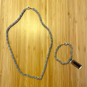 Matching silver necklace and bracelet set